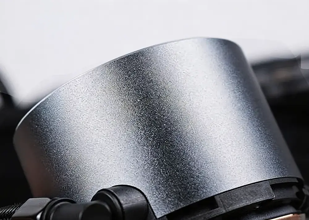 Matte uniform sandblasting surface finish on CNC machined aluminum component, metal surface blasting treatment service for industrial precision parts