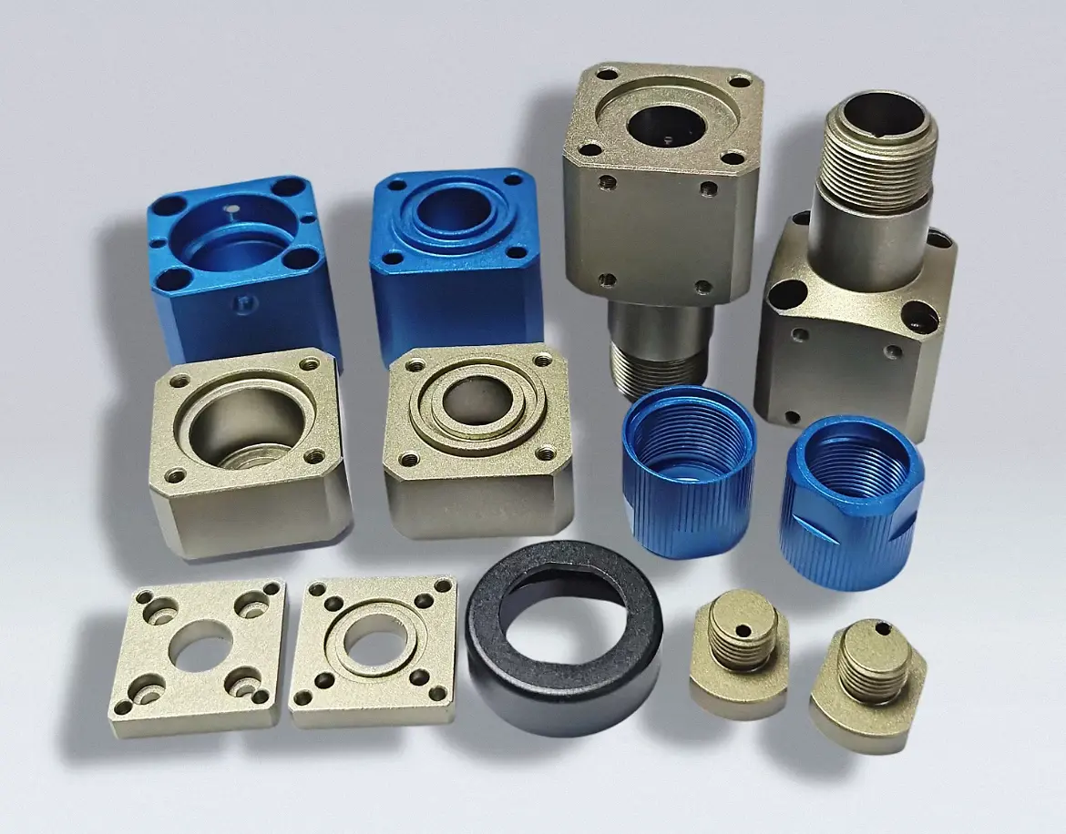 CNC-machined aluminum housings, sleeves, and flanges with multicolor anodized finishes
