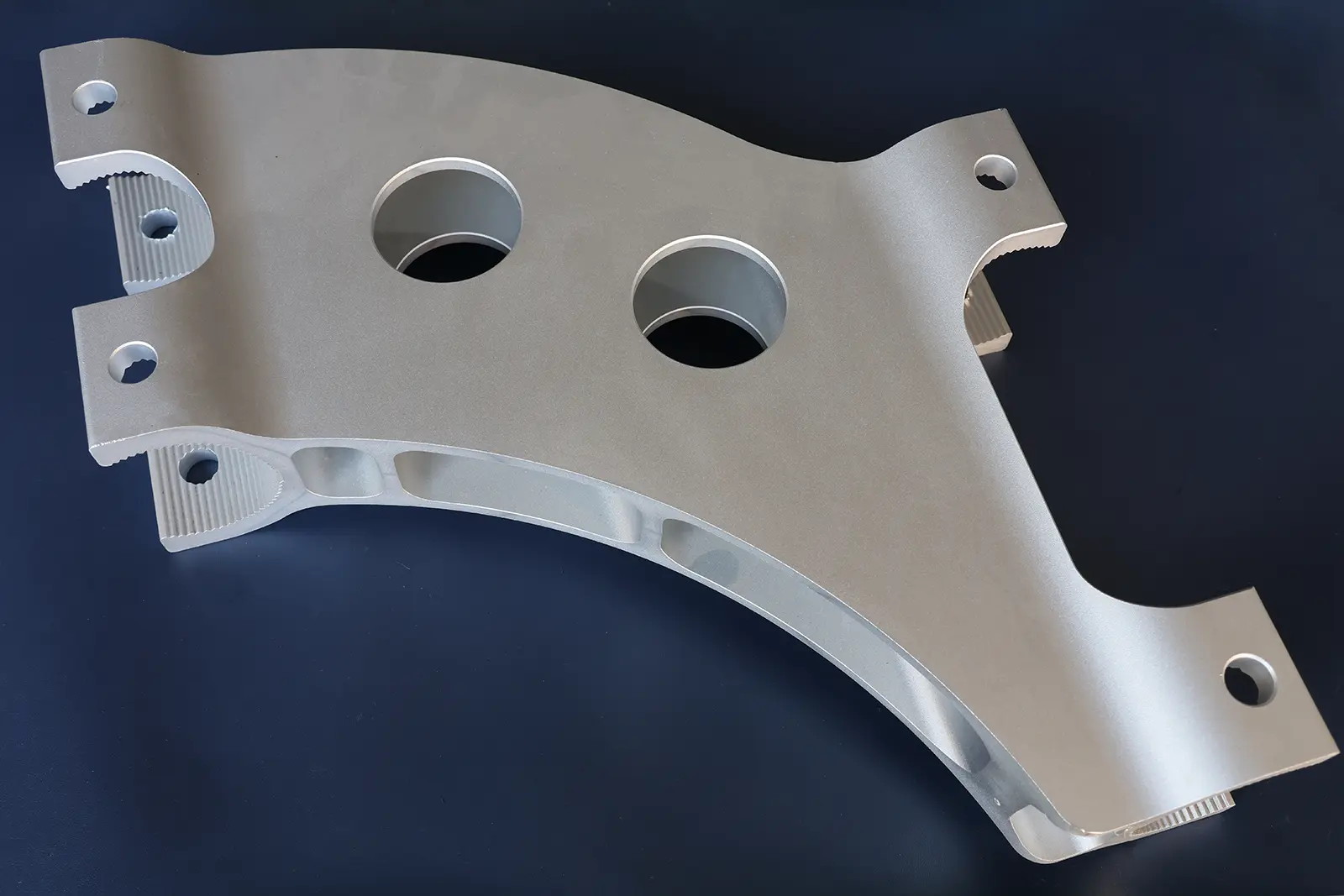 CNC-milled curved aluminum automation bracket