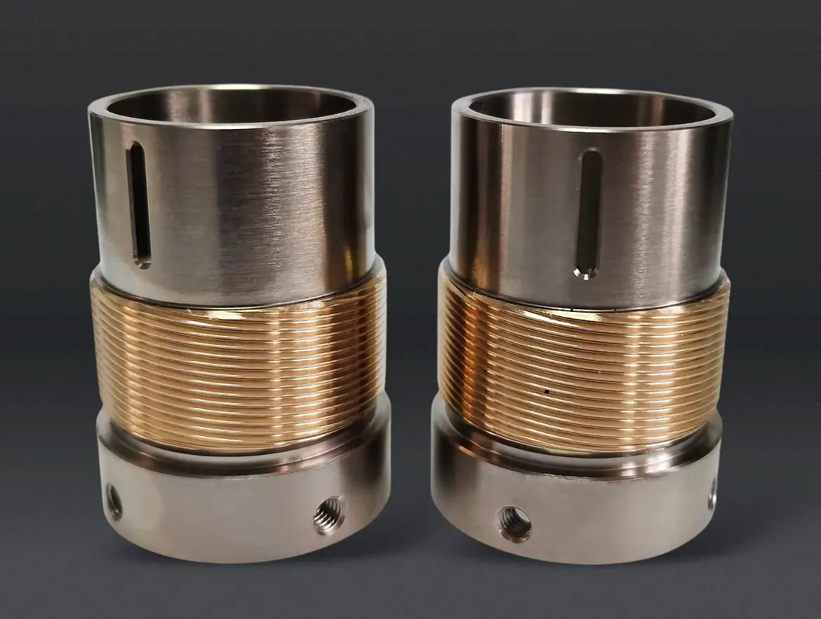 CNC-turned stainless-steel sleeves with brass threads
