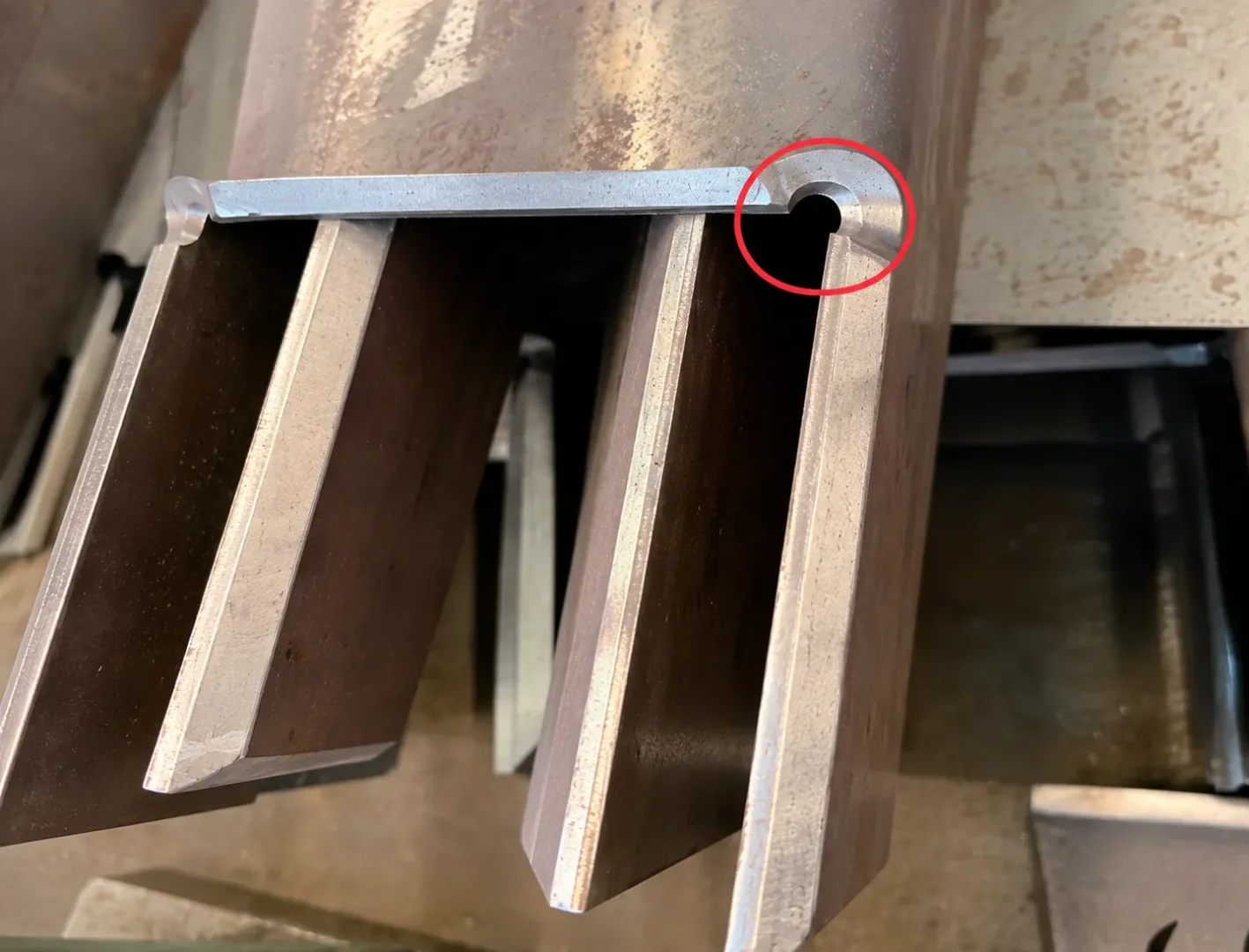 Bend relief hole added at the corner of a formed sheet metal part